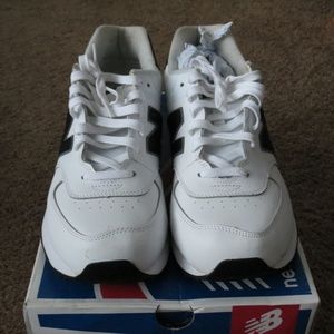 White and Black New Balances Size 11 1/2